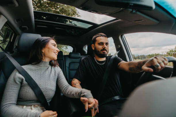 istock couple talking in the car 1396684243