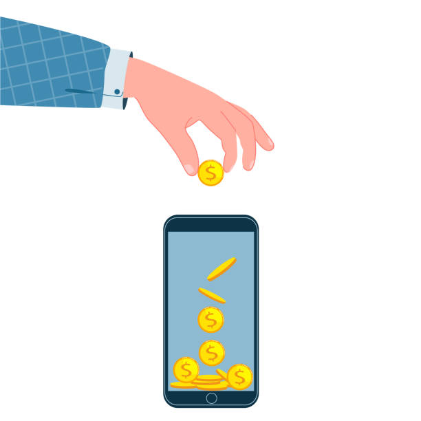 istock Hands with gold coins on a white background. The hand puts coins in the smartphone. The concept of online payment, donations, recharge, savings. 1396684257