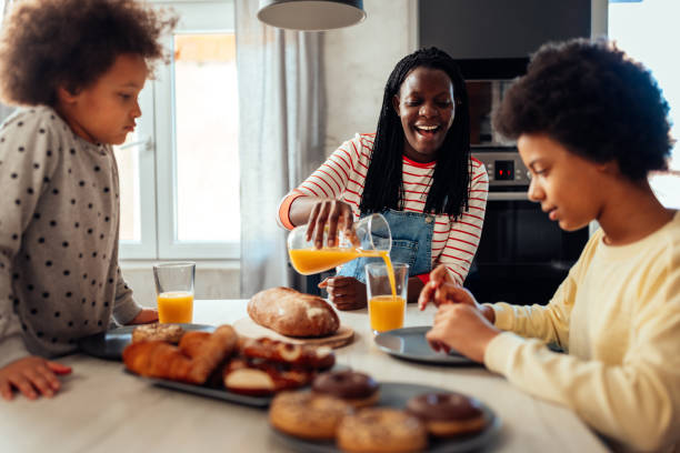 istock Family having breakfast together at home 1396684311