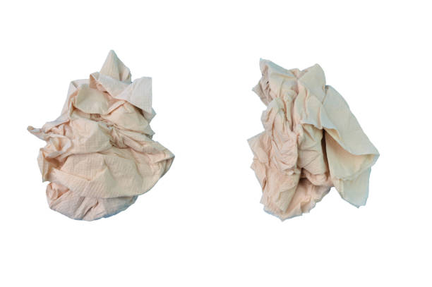 lenços de papel amassados marrons isolados em um fundo branco - tissue crumpled toilet paper paper - fotografias e filmes do acervo
