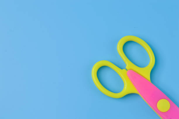 istock Scissors isolated on a blue background. School and office supplies 1396686849