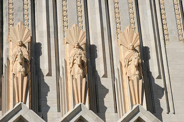 Terra Cotta Figures Above Doors to Boston Avenue Methodist Churc The Boston Avenue Methodist Church, located in downtown Tulsa, Oklahoma, is considered by many to be the finest Art Deco church in the United States. tulsa landmark stock pictures, royalty-free photos & images