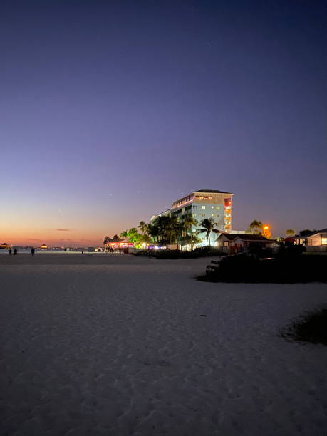 istock Sunset behind hotels on the beach. 1396689449