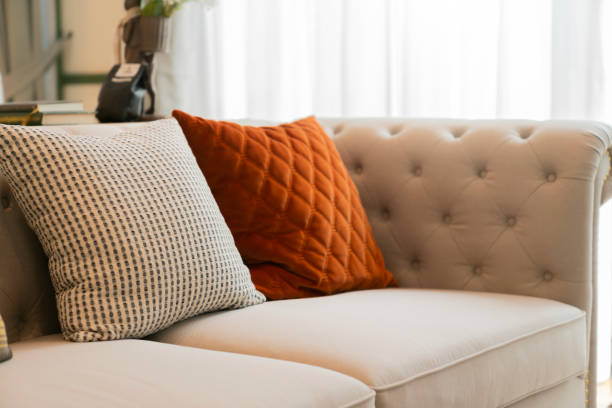 istock close up decorative pillow cushion arrange with pattern on soft beige sofa couch in living room home interior design concept,home sweet home ideas 1396690729
