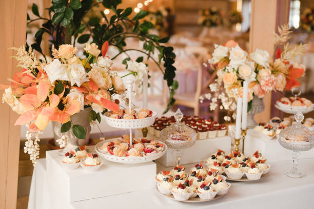 istock Candy bar with tasty desserts and appetizers at the wedding reception. 1396691090