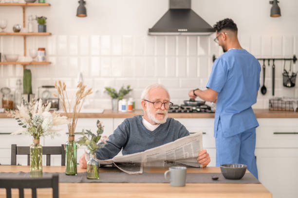 istock Elderly person waiting for his breakfast at the table 1396691248