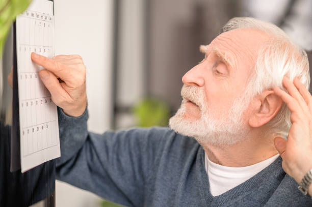 istock Senior male patient undergoing a post-stroke rehabilitation 1396691326