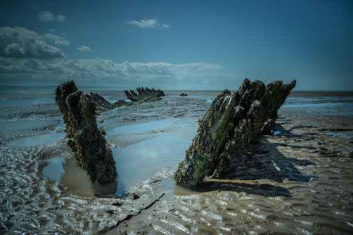 SS Nornen Shipwreck, Berrow, reflecting in pools of water on a sunny day