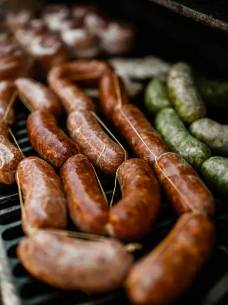 Photo of Mexican BBQ sausage variety on the BBQ grill