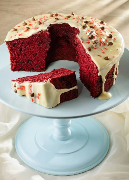 istock Delicious red velvet cake, on a light blue cake stand 1396692023