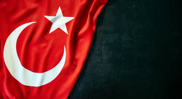 istock turkish flag on black stone background 1396692037