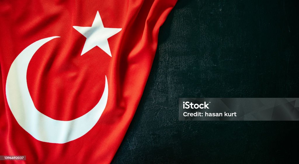 turkish flag on black stone background Turkish Flag Stock Photo