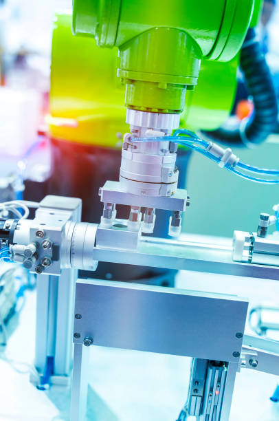 istock Automatic industrial robotic robot working, industry 4.0 and technology concept 1396692402