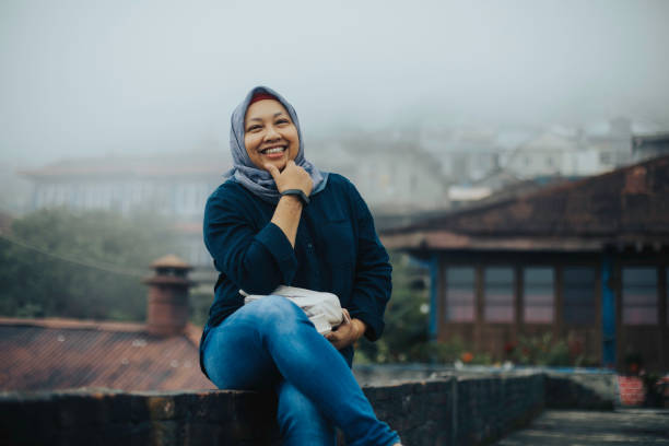 mature woman  visiting a  Dusun Butuh, Magelang known as  Nepal Van Java