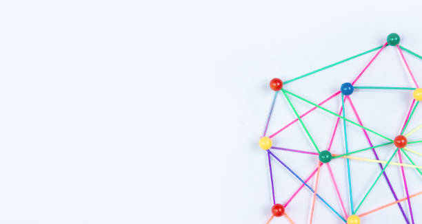 istock Linking entities, Blockchain, social media, Communications Network, The connection between the two networks. Network simulation on paper linked together by yarn 1396693794