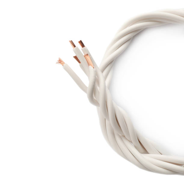 istock Many twisted electrical wires on white background 1396694499