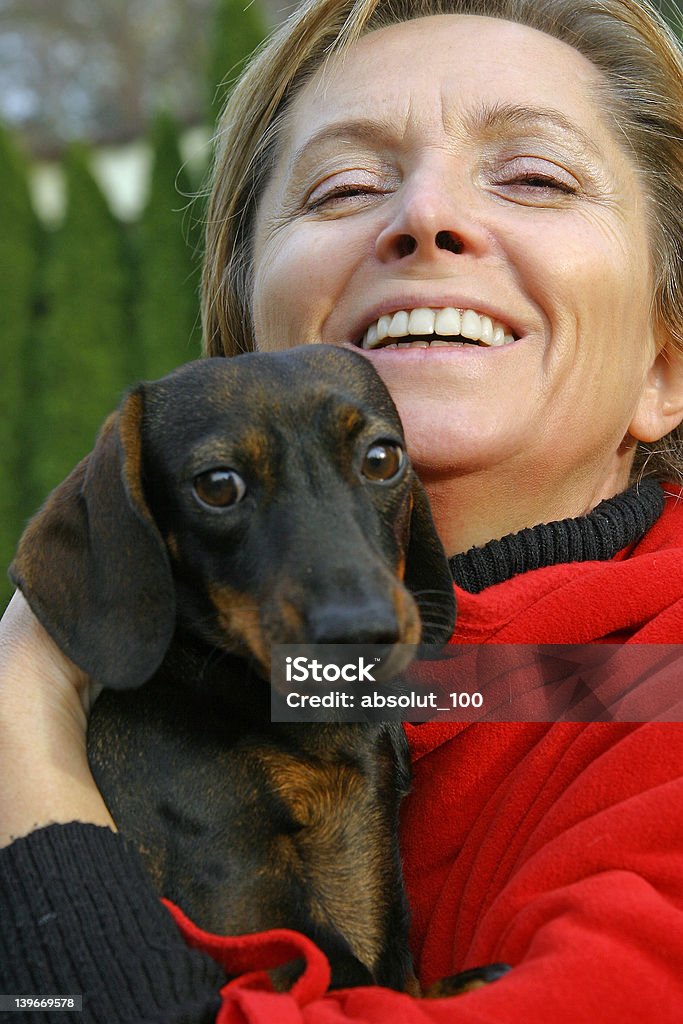 Frau in ihren fünfziger mit Hund - Lizenzfrei 45-49 Jahre Stock-Foto