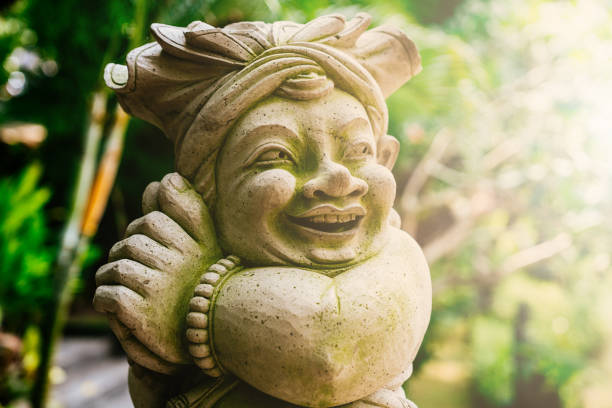 Ho Chi Minh, Vietnam 12 December 2015: Traditional Vietnamese statues displayed in temple setting, carved figures with historic details, cultural heritage art, Asian religion sculpture, stone and wood materials, travel destination in Vietnam
