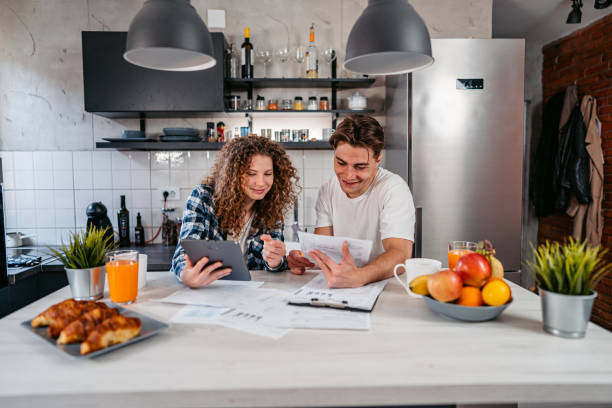 istock Young Couple Discussing Their Finances 1396697778