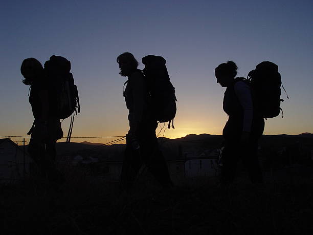 three hikers in camino de santiago - double_p stockfoto's en -beelden