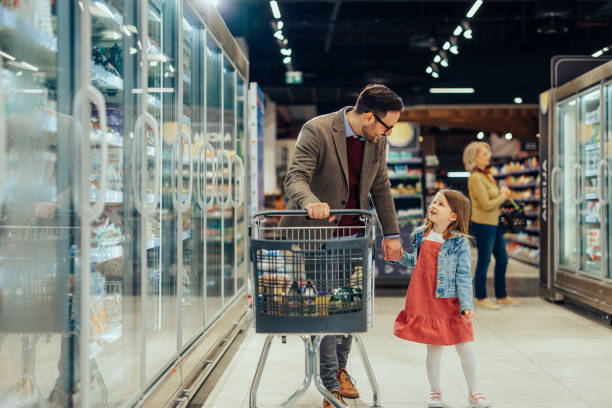 istock Dad and daughter talking about shopping 1396698434