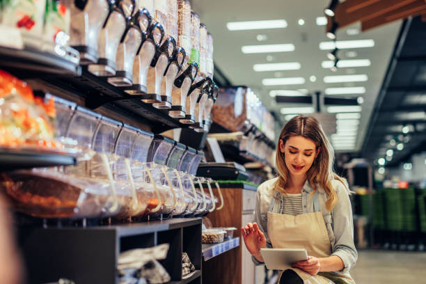 istock Woman doing the inventory at a supermarket 1396698628