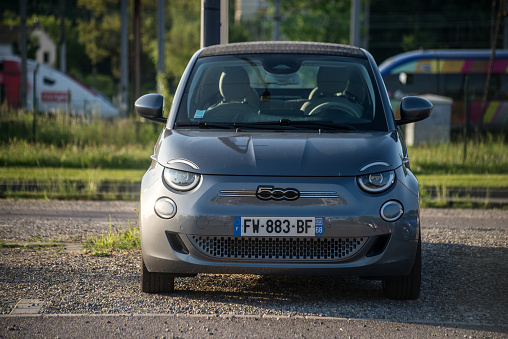 Mulhouse - France - 3 May 2022 - Front view of grey electric Fiat 500 parked in the street