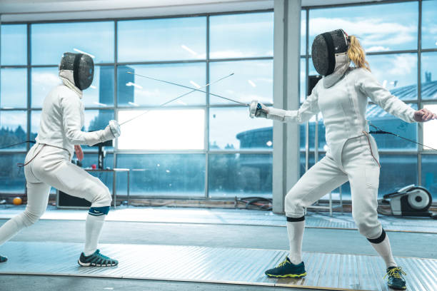 istock Female fencing competitive duel 1396700849