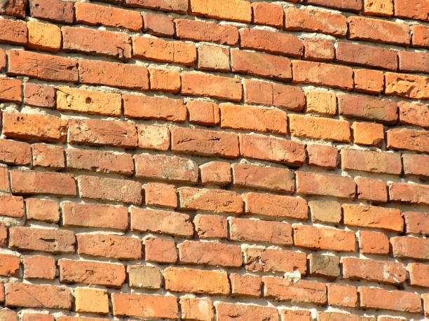 Ancient brick wall stock photo