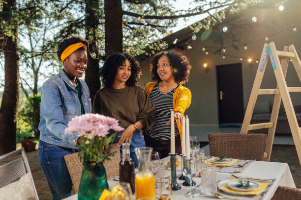 istock Mother and daughters preparing the outdoor dinner 1396708985
