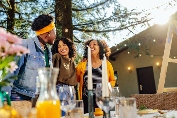 istock Smiling three women at outdoors gathering 1396709038