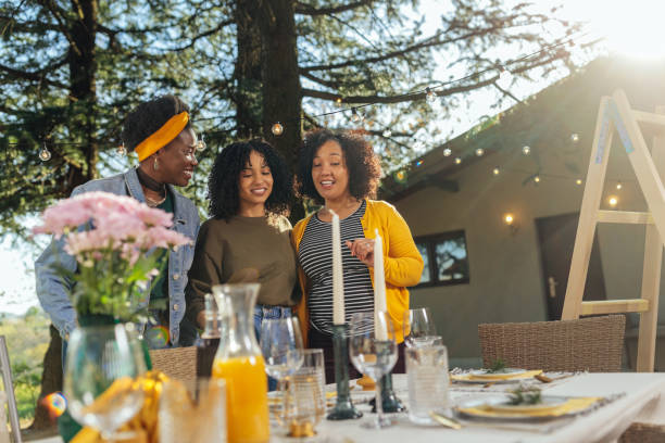 istock Three african american women at outdoors gathering 1396709588