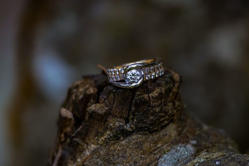 White and yellow gold ring with diamond rock.