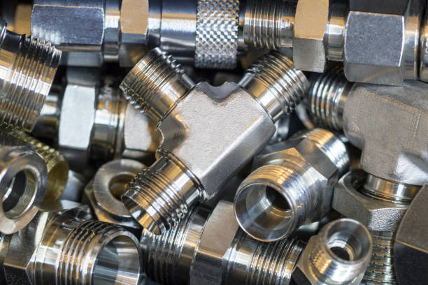 istock Quick connect fittings coupling for assembling compressed air, hydraulics, pneumatics, gases, fuel lines. Lays in a chaotic manner. 1396713195