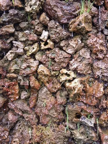 Photo of Ragged stones in the wall in the prehistoric Incas fertility temple in Chucuito, Puno Peru