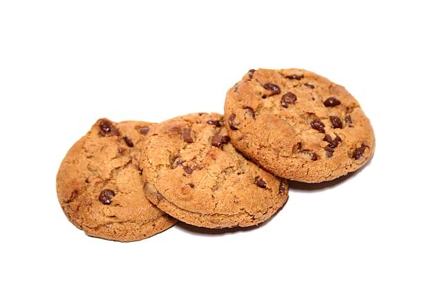 istock Three chocolate chip cookies against a white background 139672001