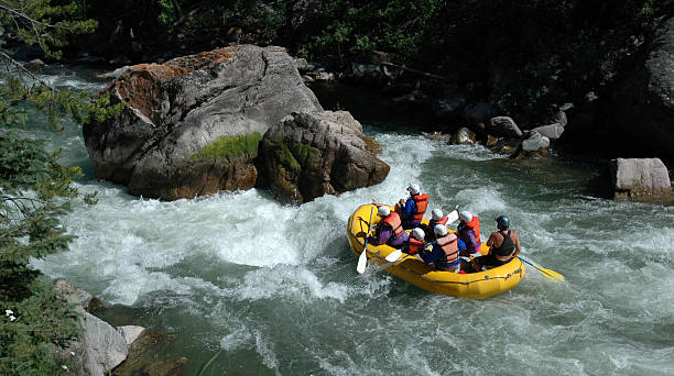 Rafting on the Gallatin River Rafters on the Gallatin River approaching House Rock rafting stock pictures, royalty-free photos & images