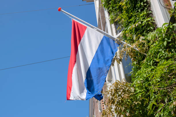istock Close Up Flag Half Pole At Amsterdam The Netherlands 1396721658
