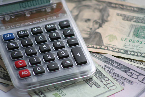 calculator and  money stock photo