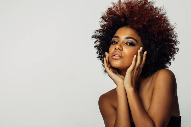 istock Beautiful afro woman with perfect make-up 1396724147
