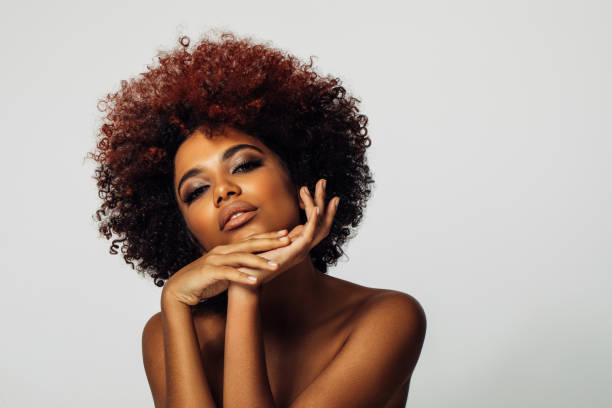 istock Beautiful afro woman with perfect make-up 1396724159