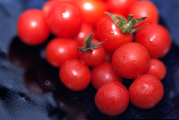Cluster of Cherry tomatoes stock photo
