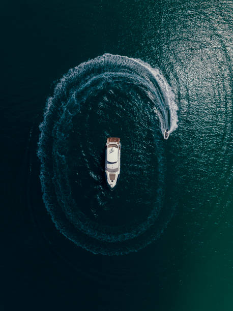 istock Zodiac Boat Spinning Around A Yatcht 1396727699