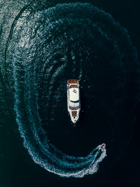 istock Zodiac Boat Spinning Around A Yatcht 1396727706