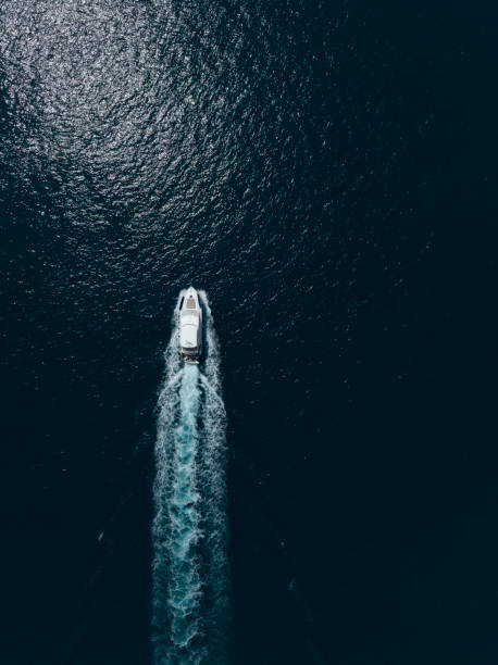 Luxury Yacht Aerial View of Luxury Yacht on the mediterranean  sea. Taken via drone. Antalya, Turkey. spume stock pictures, royalty-free photos & images