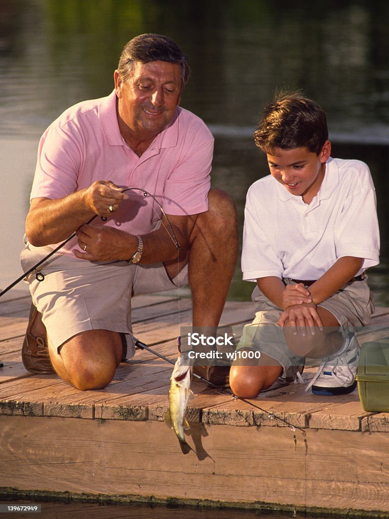 Menino e o avô de Pesca - Royalty-free Adulto Foto de stock