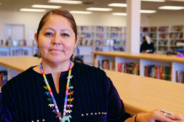 High School Teacher in a Library stock photo