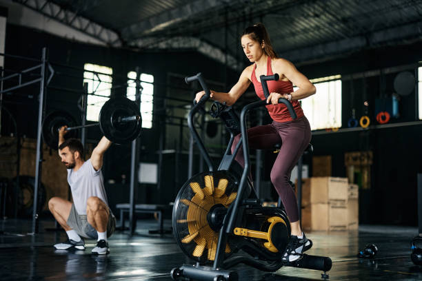 istock Athletic couple having cross training in a gym. 1396729949