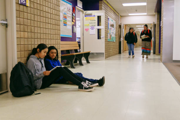 istock High School Students in a School Building 1396729973