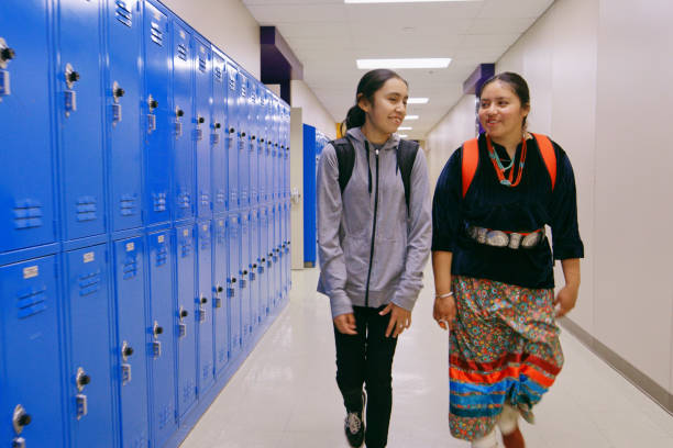 istock High School Students in a School Building 1396729997